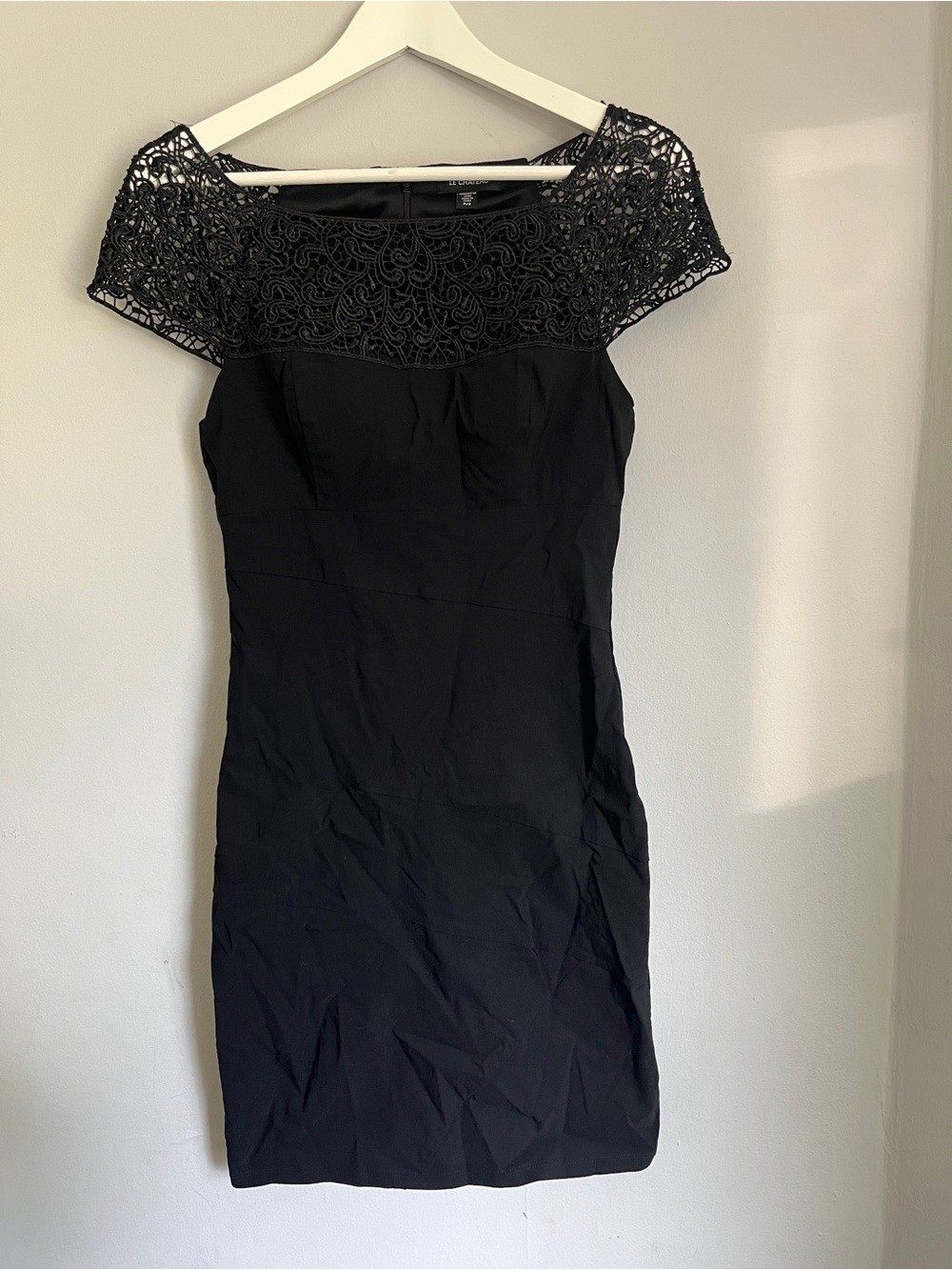 Le Chateau little black dress with lace chest and sleeve detail